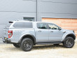 Ford Ranger Raptor in Conquer with a leisure hard top fitted