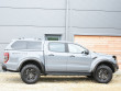 Ford Ranger Raptor in Conquer with a leisure hard top fitted