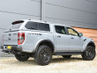 Ford Ranger Raptor in Conquer with a leisure hard top fitted